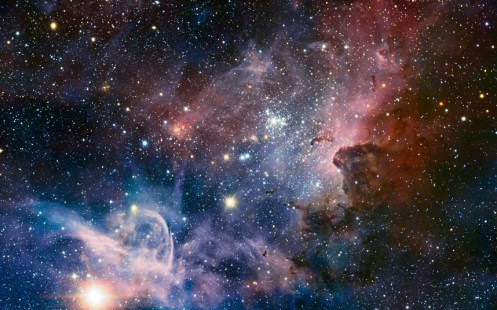 This broad panorama of the Carina Nebula, a region of massive star formation in the southern skies, was taken in infrared light using the HAWK-I camera on ESO's Very Large Telescope. Many previously hidden features, scattered across a spectacular celestial landscape of gas, dust and young stars, have emerged. Picture: ESO/T. Preibisch